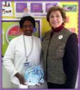 Felicia Olaoshebikan of OC WIC program with Buena Park Rotary Member Beth Swift