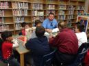 Jr. High Interact and Rotarians read to 1st grade