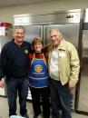 Rotarians in front of purchased large capacity refrigerator