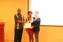 Lena receiving scholarship award at Rotary mtg.