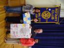 Rotarians Bill, Mona and Yessenia showing off the thank you cards