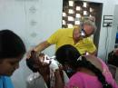 Dr. Moses continues assisting Smiles